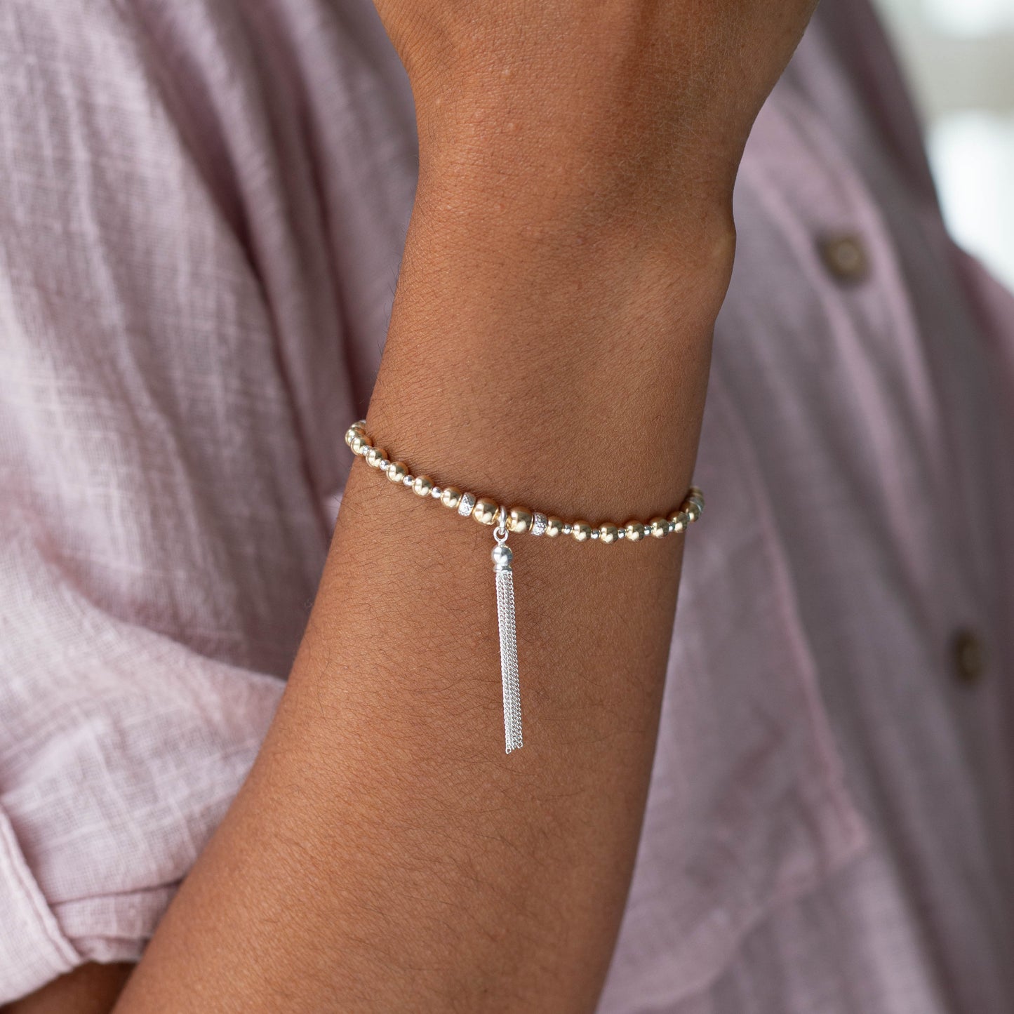 Luxurious Silver and 14-karat Tassel Bracelet