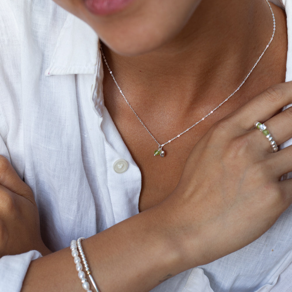 Delicate silver necklace with Peridot gemstone and tiny Heart charm