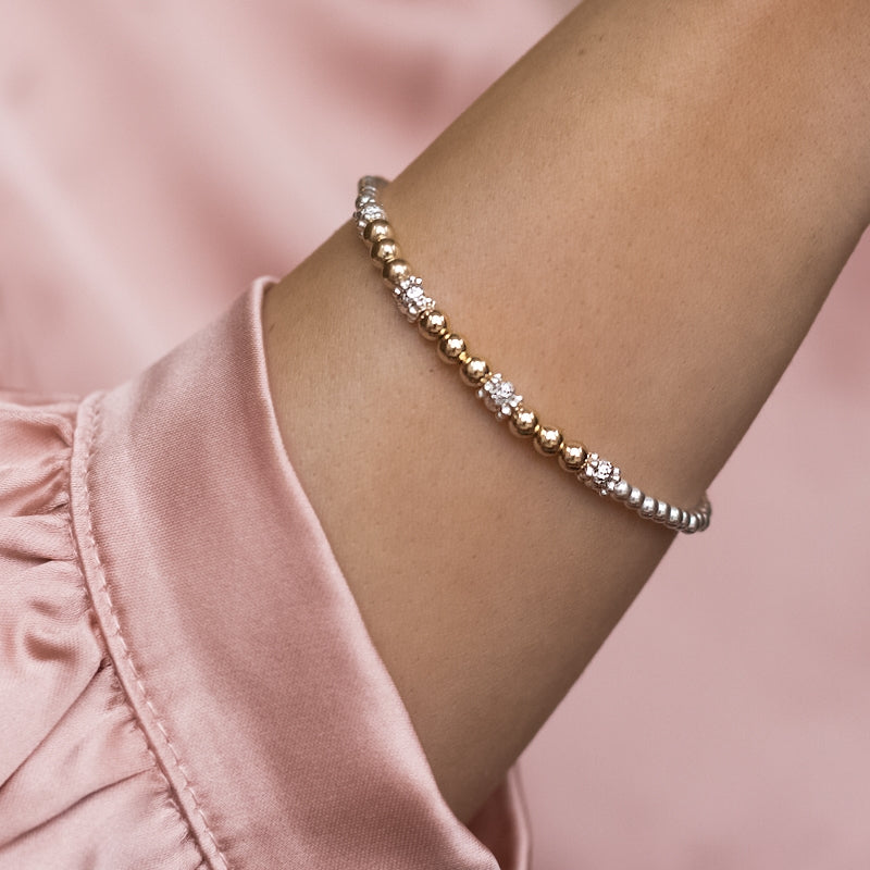 Delicate silver stacking bracelet with 14k gold filled beads