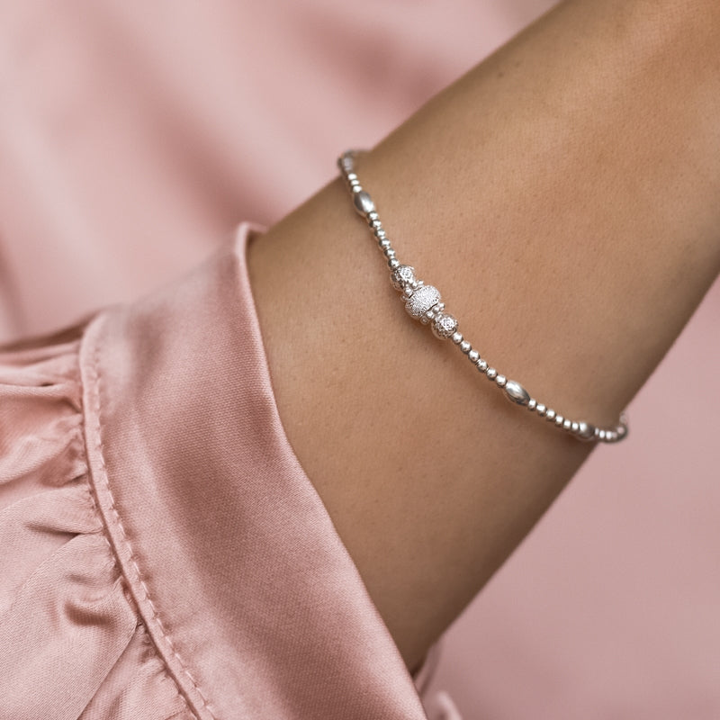 Elegant 925 sterling silver ball elastic/stretch stacking bracelet with pretty frosted bead