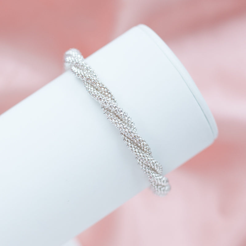 Sterling Silver Twisted Chain Bracelet —