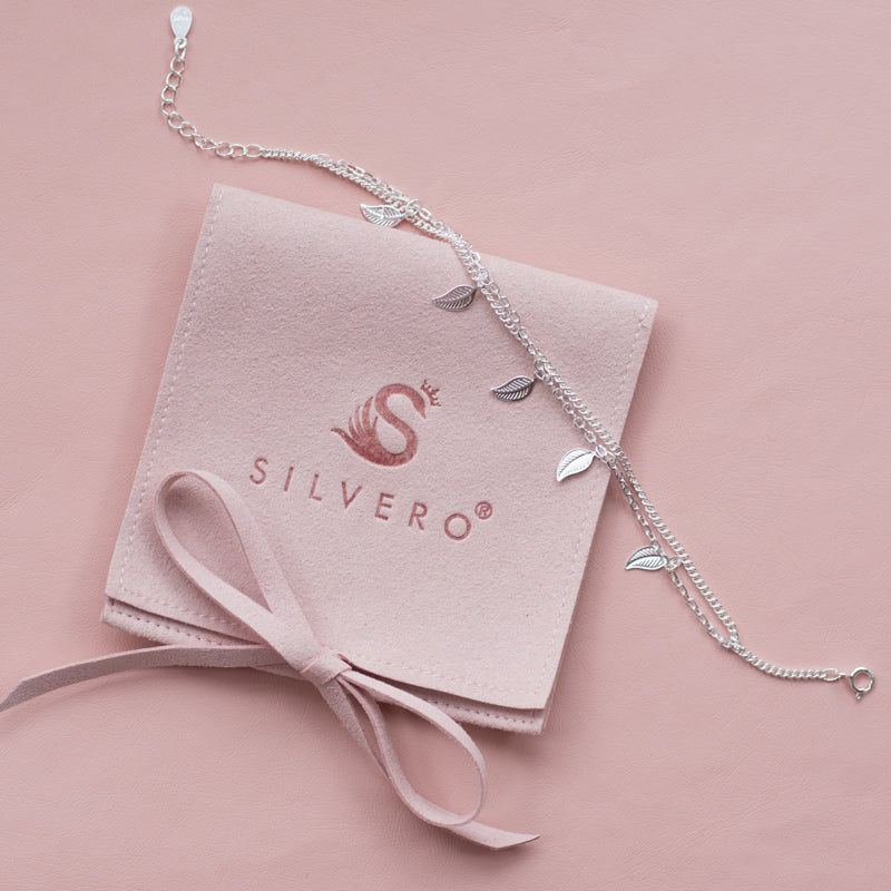 Delicate layered 925 sterling silver chain bracelet with tiny leaf charms