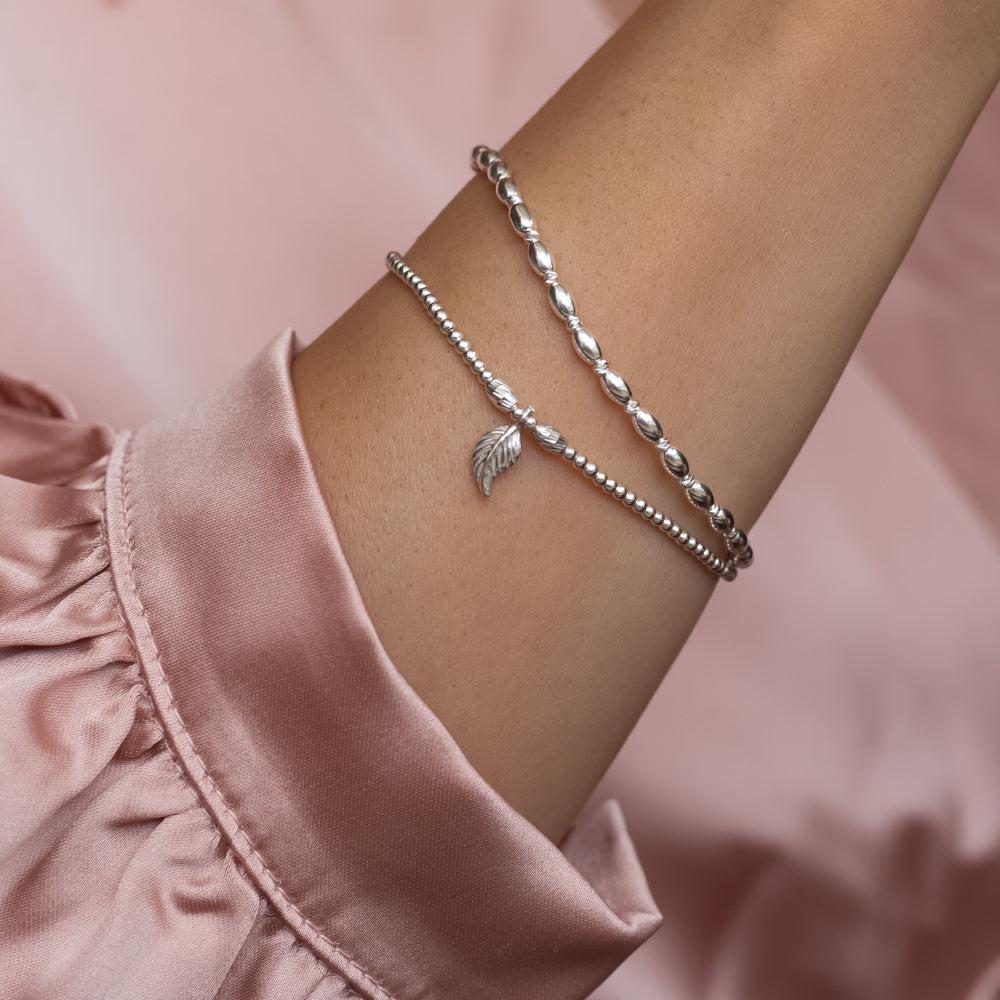 Minimalist 925 sterling silver bracelet stack with tiny Leaf charm