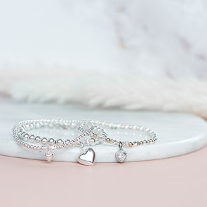 Minimalist silver stacking bracelet with adorable tiny Heart charm