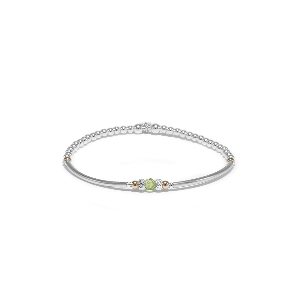 Elegant tube silver bracelet with Peridot gemstone and multicut silver beads