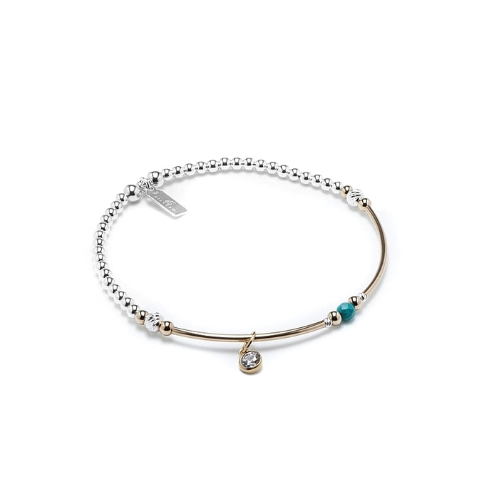 Delicate sterling silver stacking bracelet with 14k gold filled beads, Turquoise gemstone and Cubic Zirconia charm
