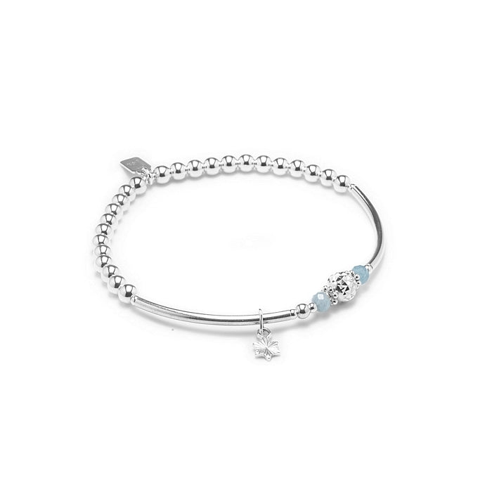 Fashionable little sliding Star silver stacking bracelet with Aquamarine gemstone