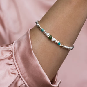 Oriental 925 sterling silver stretch bracelet with 14K gold filled beads and Turquoise gemstone