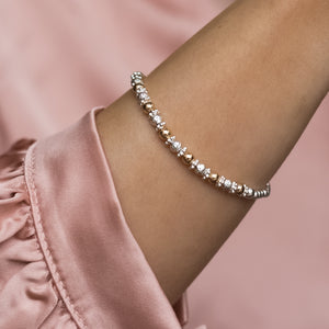 Elegant 925 sterling silver and 14k gold filled stretch bracelet with dazzling multicut silver beads