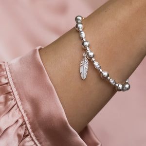 Luxury 925 sterling silver stacking bracelet with Feather charm