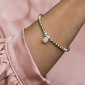 Elegant 925 sterling silver and 14k gold filled bracelet with Lotus Flower charm