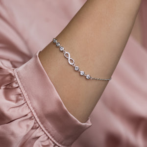 Elegant infinity 925 sterling silver bracelet with Cubic Zirconia stones - Rhodium plated