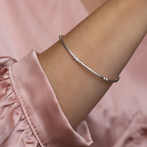 Minimalist tube sterling silver stacking bracelet with dazzling beads