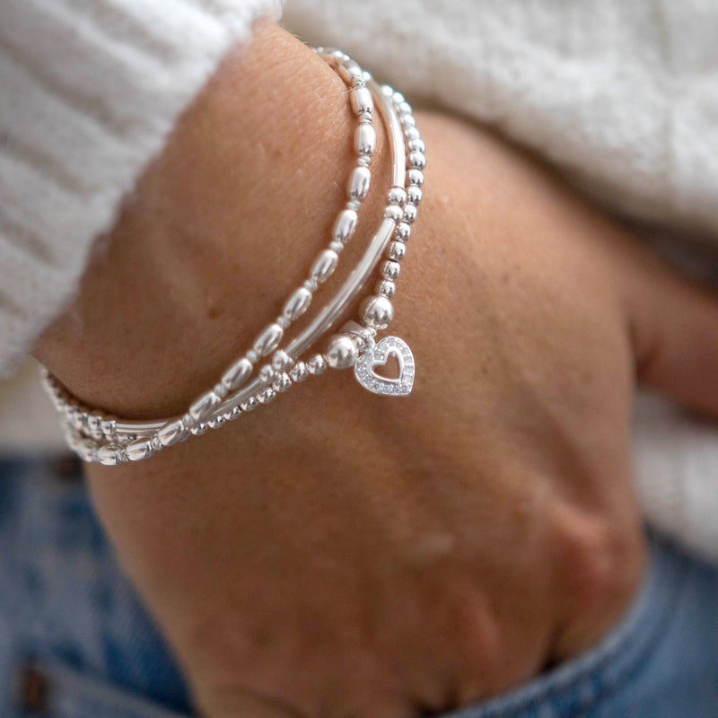 Minimalist tube sterling silver stacking bracelet with dazzling beads