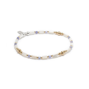 Delicate Tanzanite stacking bracelet with Mother of Pearl beads