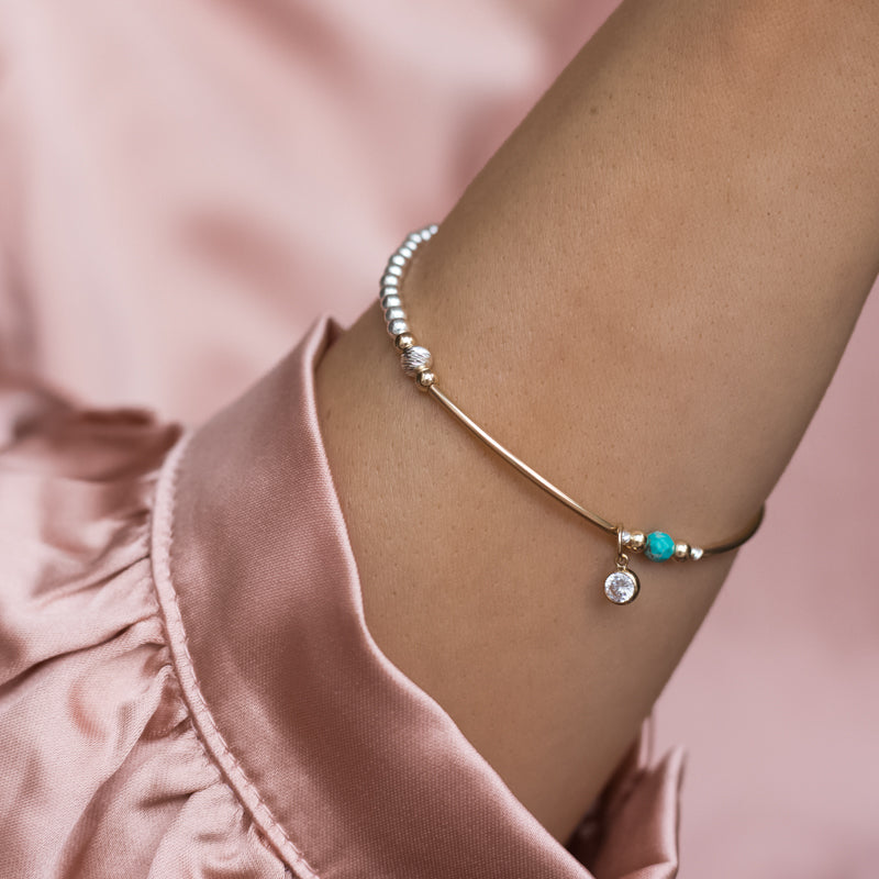 Delicate sterling silver stacking bracelet with 14k gold filled beads, Turquoise gemstone and Cubic Zirconia charm