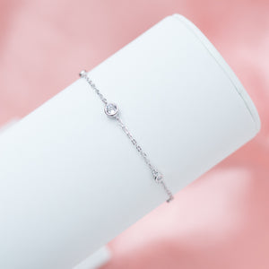 Delicate 925 Sterling silver minimalistic bracelet decorated with Cubic Zirconia stones - Rhodium platedDelicate silver minimalistic bracelet decorated with Cubic Zirconia stones - Rhodium plated