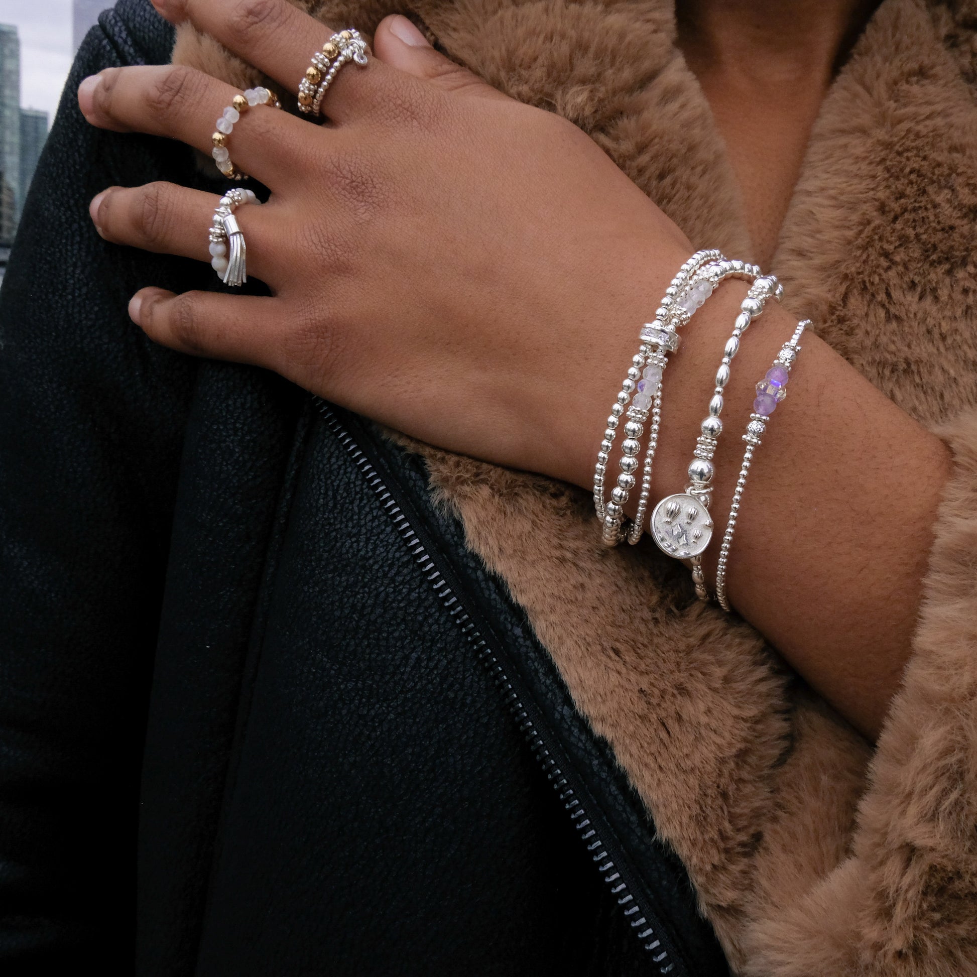 Delicate Amethyst silver stacking bracelet with rainbow AB glass bead