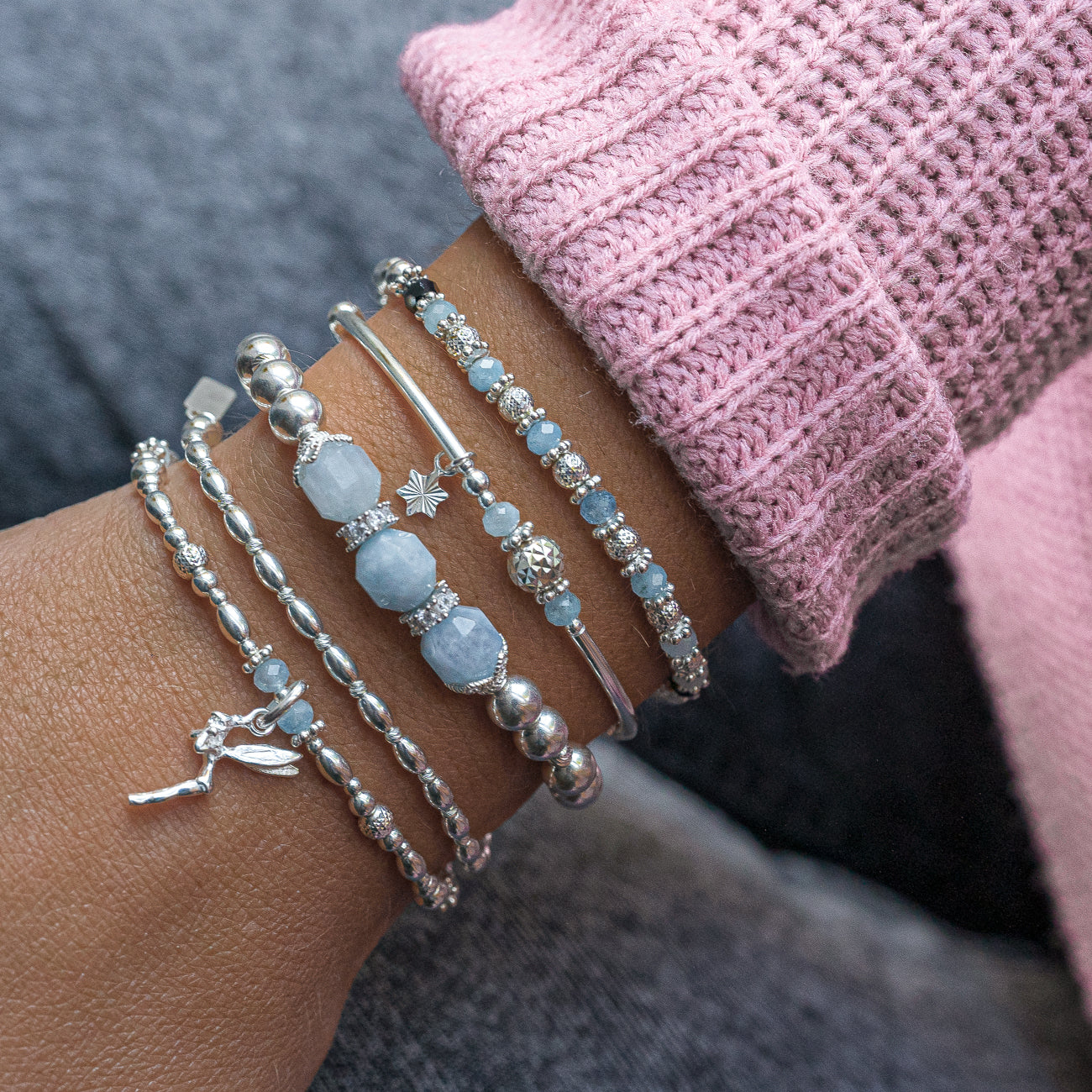 Fashionable little sliding Star silver stacking bracelet with Aquamarine gemstone