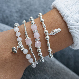 Romantic Rose Quartz gemstone silver stacking bracelet with heart charm